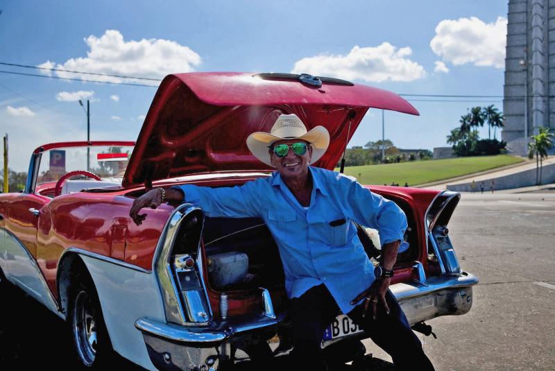 My driver for an afternoon, Ernesto deligthed in showing off his car - and his city, Havana.